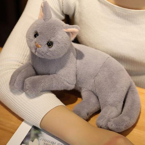 Chat en peluche comme un vrai online